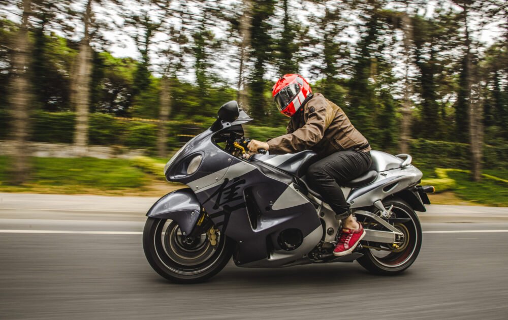 high-speed-motorcycle-biking-road-accross-forest